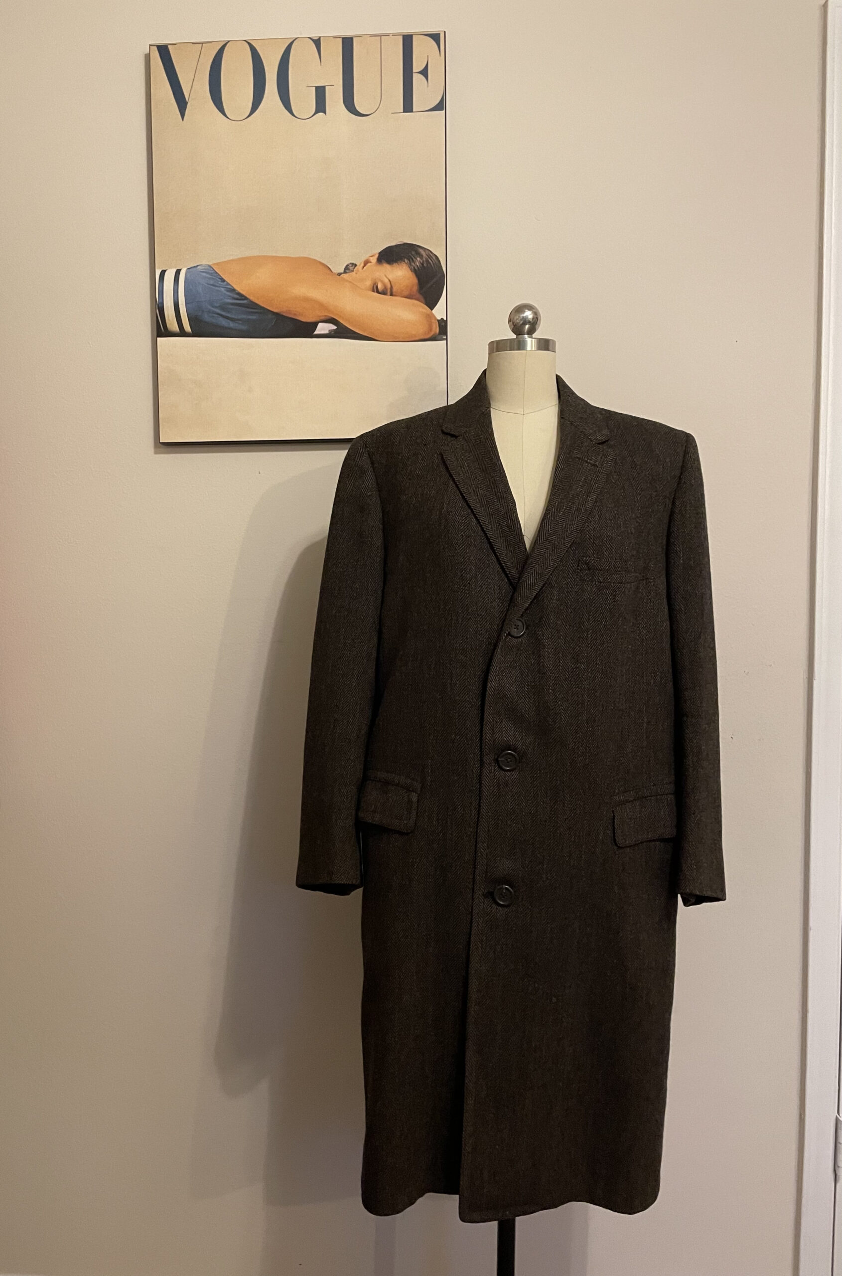 large jacket on mannequin prior to being redesigned 