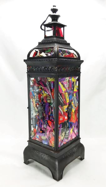 Capture glass haunted house with candy inside