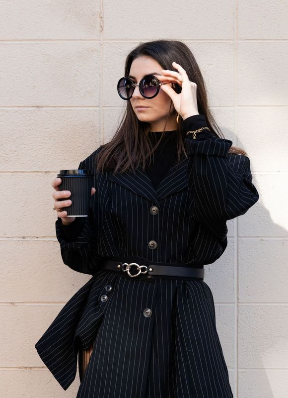 Cassidy Burel in sunglasses and black jacket 