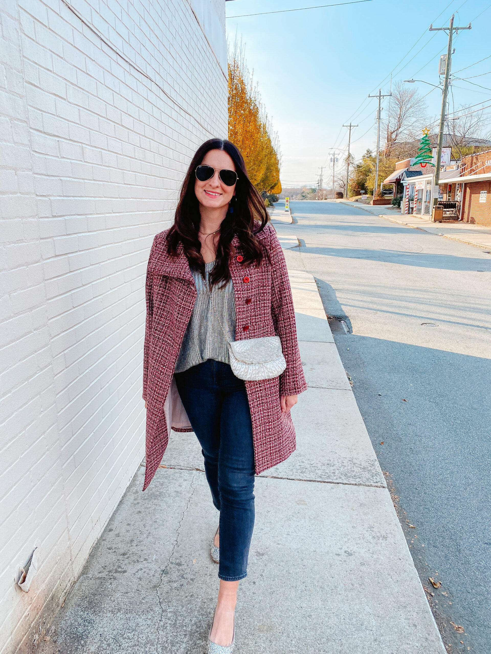Emily Soto in a pink tweed coat